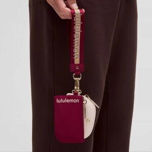 75&76 Lululemon Dual Pouch Wristlet Wordmark - Deep Luxe Gold Bone